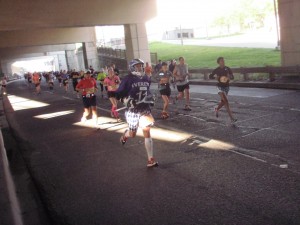 Runner in full lacrosse gear