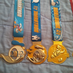 Walt Disney World Half-Marathon Medals from 2012, 2013, and 2014