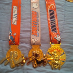 Walt Disney World Goofy Challenge Medals from 2012, 2013, and 2014