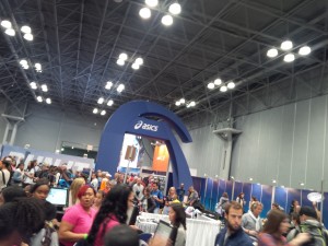 Lineup outside the Asics booth for official merchandise