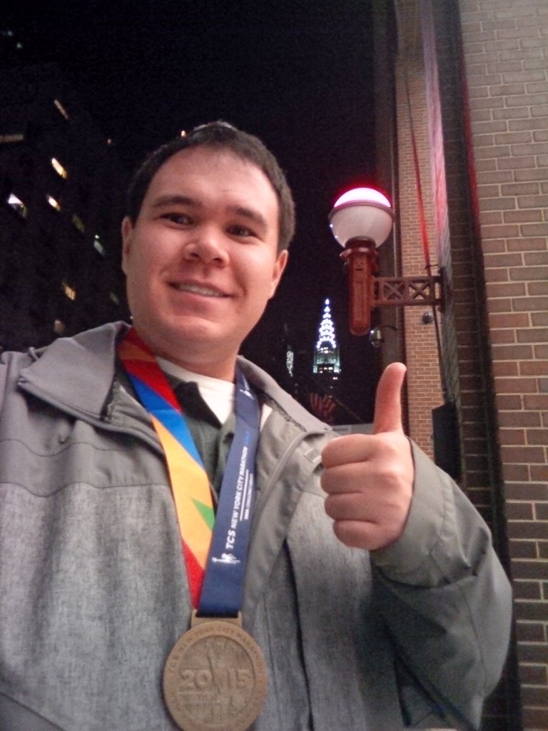 Showing off me medal after cleaning up