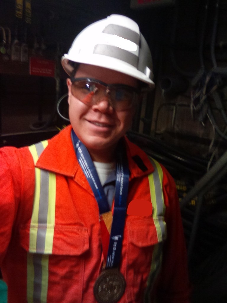 Wearing my race medal at work following the race with my Arc Flash protective gear
