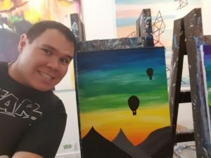 Posing with my hot air balloon painting