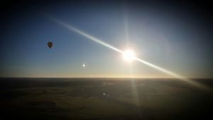 Sunrise, and view of another hot air balloon from our hot air balloon
