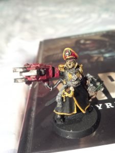 I painted a miniature character model of Commissar Sebastian Yarrick, the main character from the aforementioned book